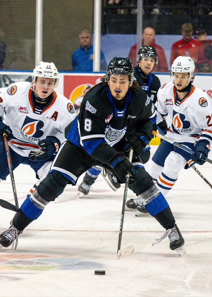 A Victoria Royals player breaks into the offensive zone during a hockey game in Victoria, BC