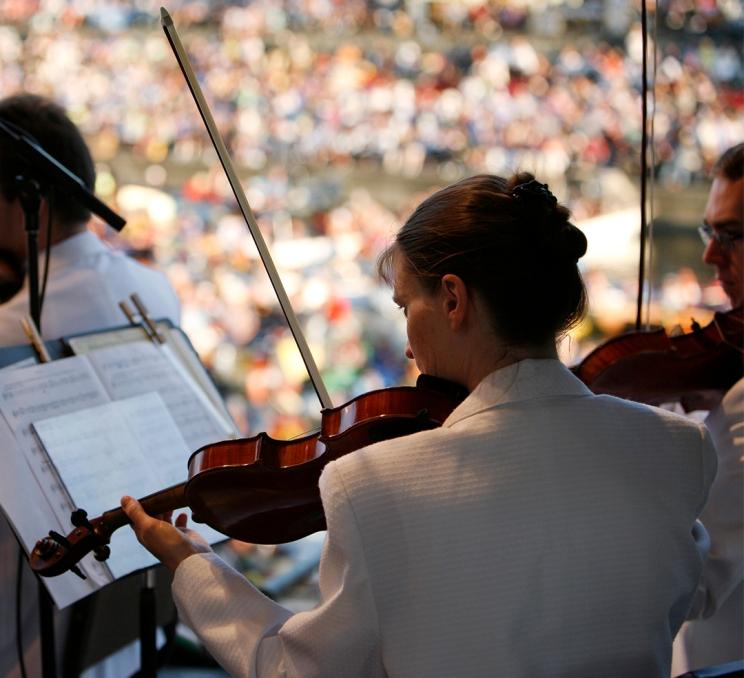 A violinist performs during Symphony Splash! in Victoria, BC