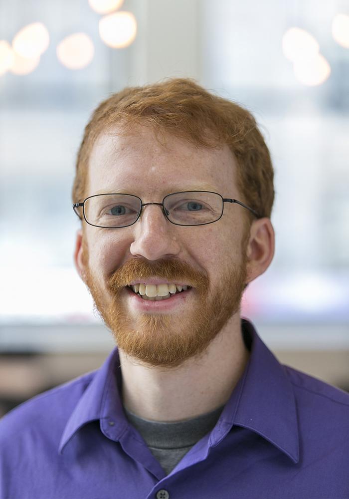 A headshot of Dr. Thomas Baker from the University of Victoria