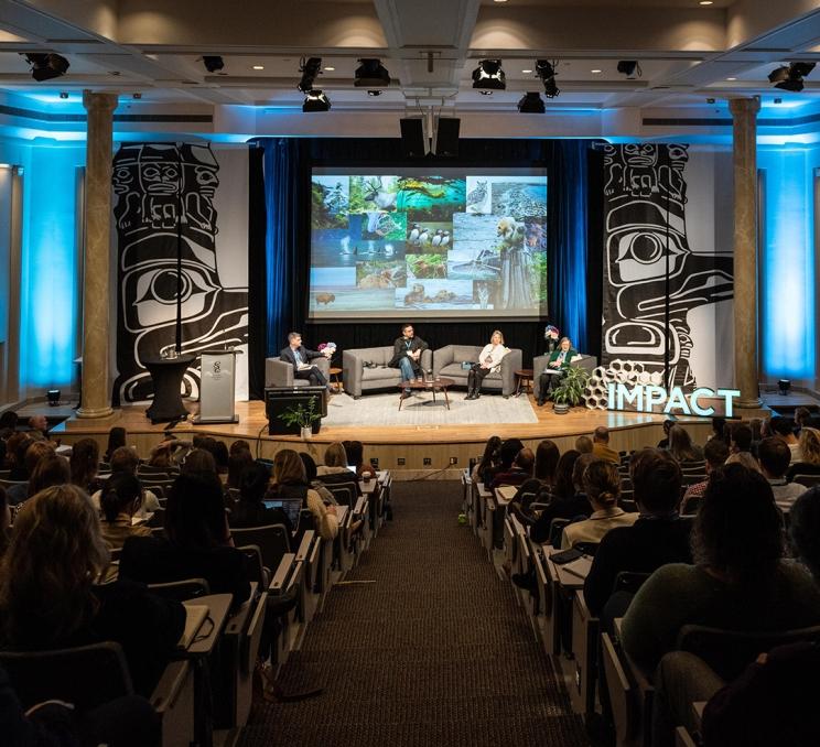 A speaker session in the theatre of the Victoria Conference Centre during the IMPACT Sustainability Travel & Tourism Conference in Victoria, BC