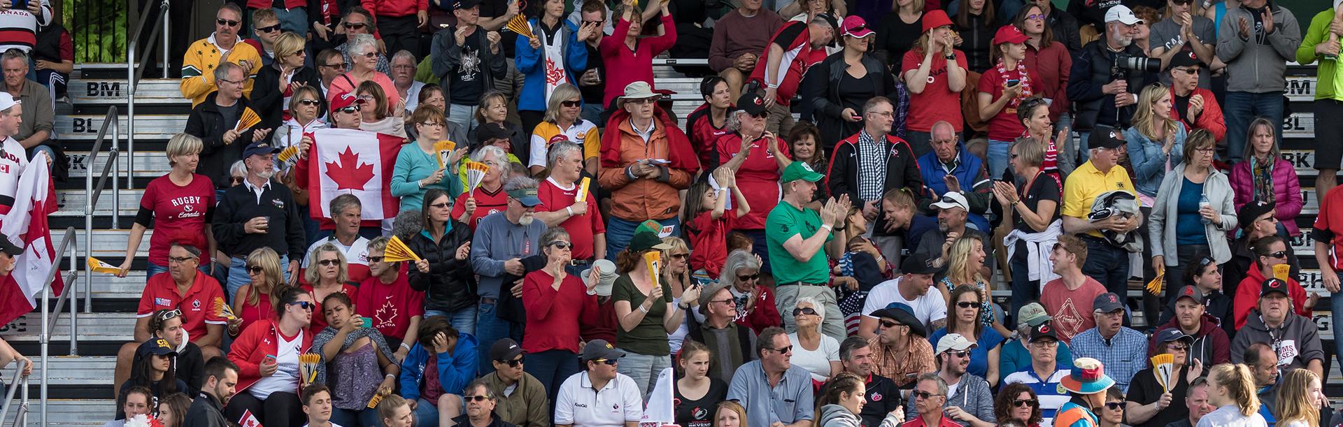 A crowd of supporters cheers at at Rugby Canada game in Victoria, BC