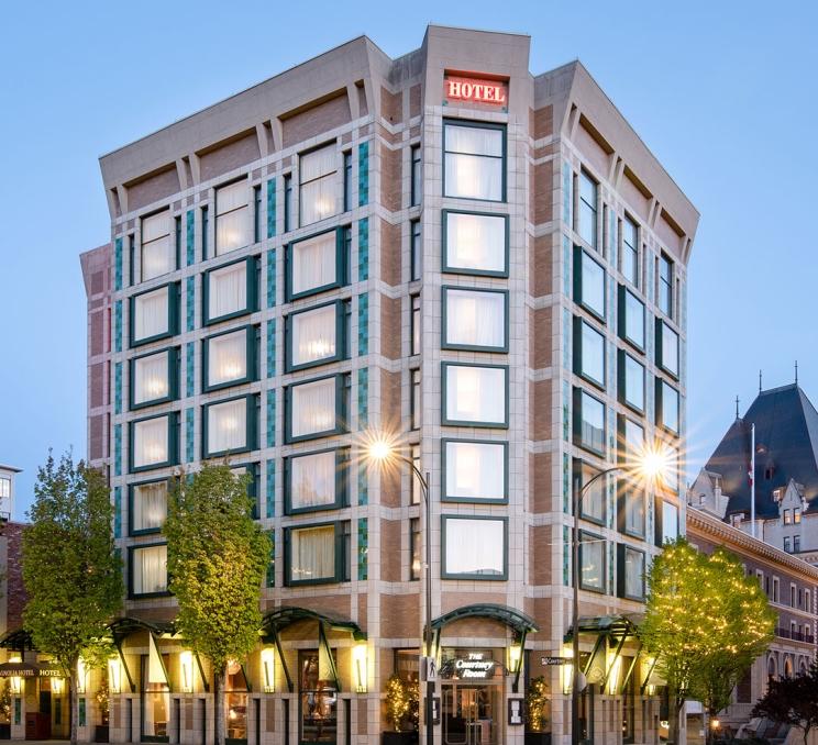 The facade of the Magnolia Hotel & Spa in Victoria, BC at sunset