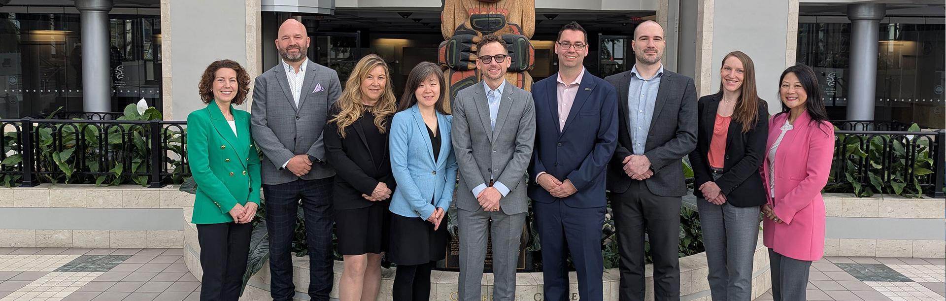 The Victoria Conference Centre team stands for a photo in the Totem Atrium of the Victoria Conference Centre in 2026