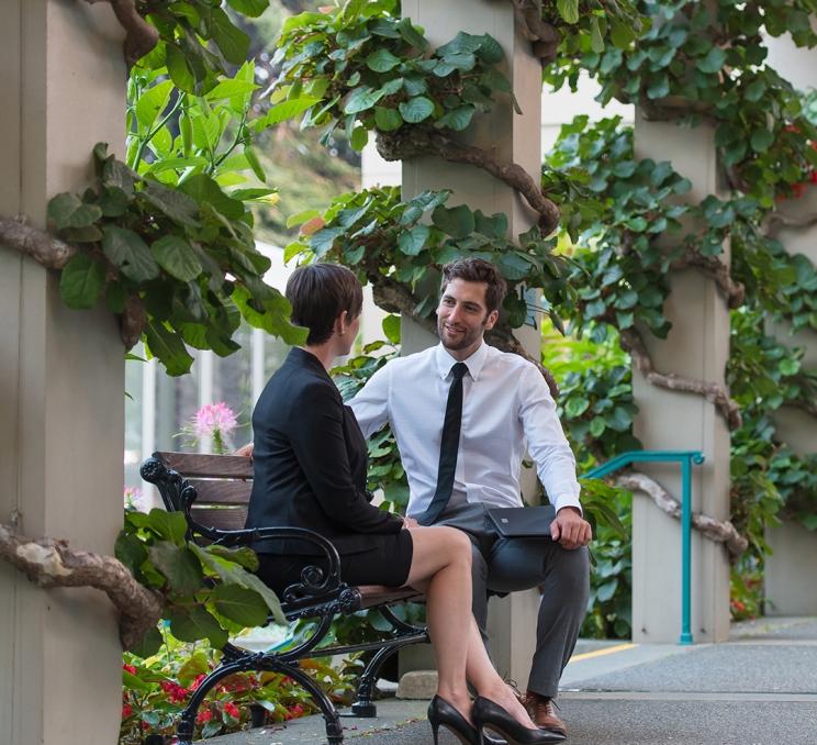 A Destination Greater Victoria Employee offers support to a member in Victoria, BC