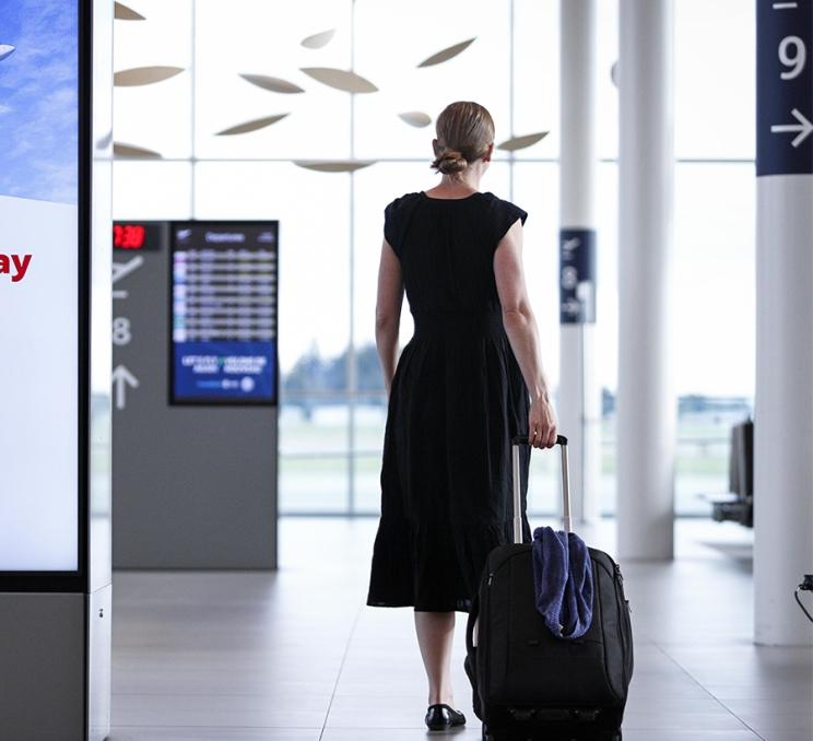 A delegate walks through the terminal of YYJ Victoria International Airport
