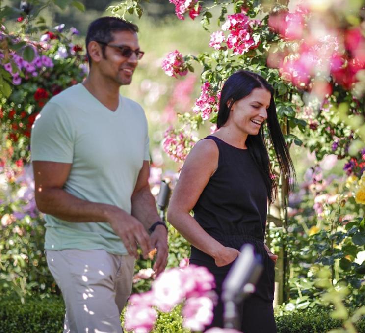 A pair of delegates explore the rose garden at The Butchart Gardens in Victoria, BC