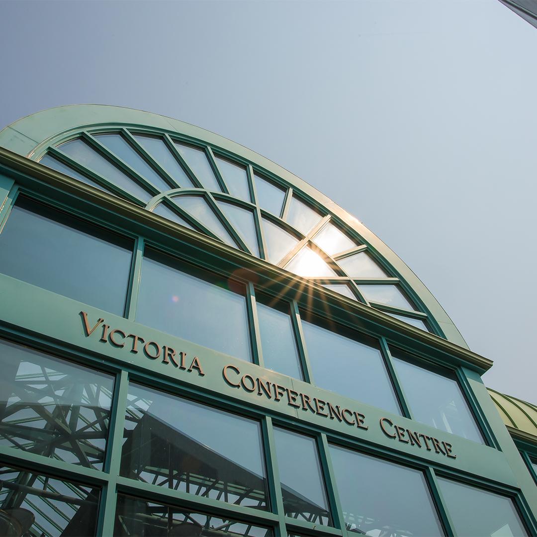 The sun reflects off the exterior of the Victoria Conference Centre in Victoria, BC