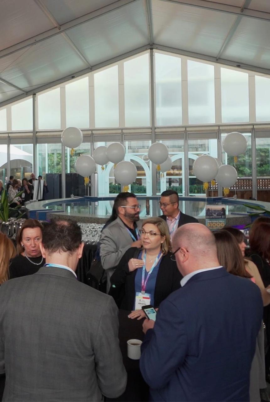 A group of delegates meeting at the Victoria Conference Centre Pavilion in Victoria, BC